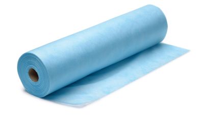 Roll of blue nonwoven fabric isolatedon white