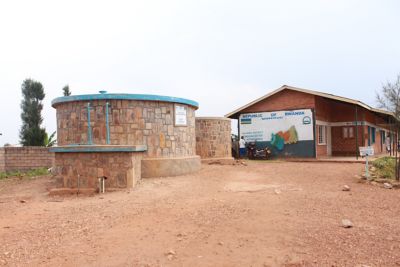 Water tank in front of a building in Rwanda.
