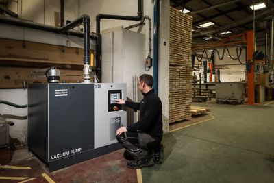 Application photos of GHS VSD+ centralised vacuum in woodworking industry pick and drop use