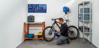 ABAC Tyre inflator. Man Inflating a bike tyre