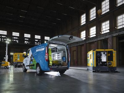 Factory floor set up with an open van showing the ASR PTE 900 about to be transported.