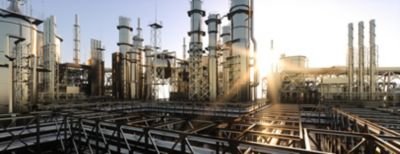 large oil refinery plant at sunrise on a clear day 3d render