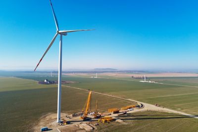 Installing new wind generator, Windmill turbine maintenance, Construction site with cranes for installing windmill tower, Wind power and renewable energy