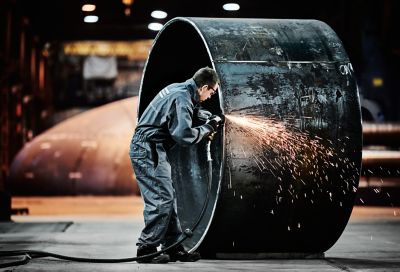 LSV39 angle grinder used by worker in overall