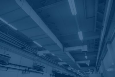 Photo of a warehouse ceiling, with a blue overlay