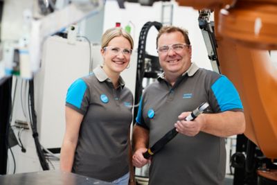Employees posing in the innovation center