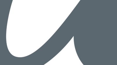 A cutout of the letters "c" and "o" from the Atlas Copco logo