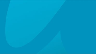 A cutout of the letters "c" and "o" from the Atlas Copco logo in blue