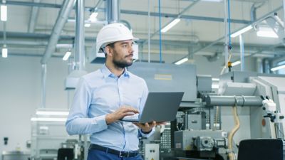 Engineer in Factory with Production Analytics 