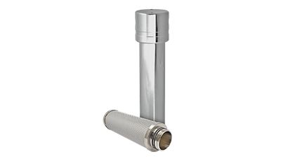 A high pressure stainless steel filter stands with its internal element, which lays in front