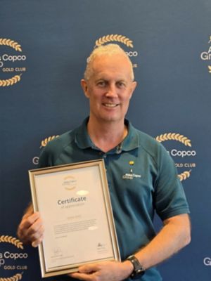 Glenn Vallis pictured with his Gold Club Certificate