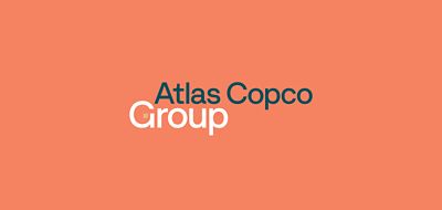 Group EVP logotype with stacked Atlas Copco in teal and Group in white on a peach background