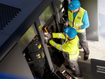 Maintenance-technicians-at-work-compressor