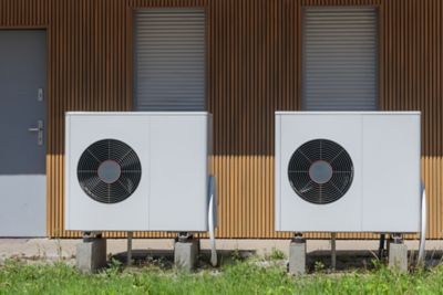 Front shot of two heat pumps