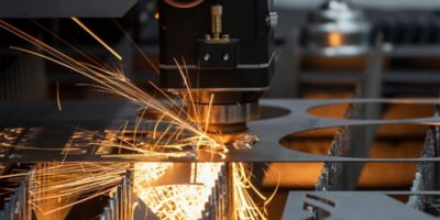 The fiber laser cutting machine cutting machine cut the metal plate. The hi-technology sheet metal manufacturing process by laser cutting machine.