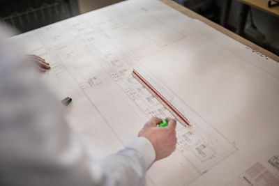 Image of an engineer working on the medical gas installation drawing. 