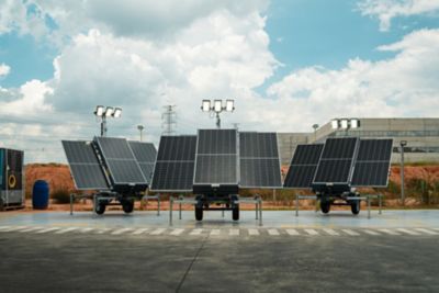 Atlas Copco's  solar-powered light towers with photovoltaic panels providing sustainable outdoor site illumination.