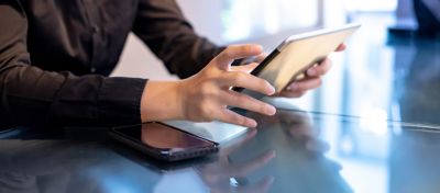 A man checking news on his device.