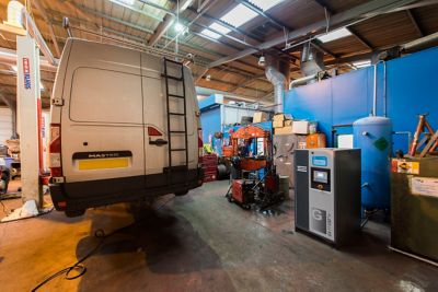 McKinnon & Forbes use Atlas Copco GA11 VSD+ compressor for their truck and van repair workshop in Scotland, UK