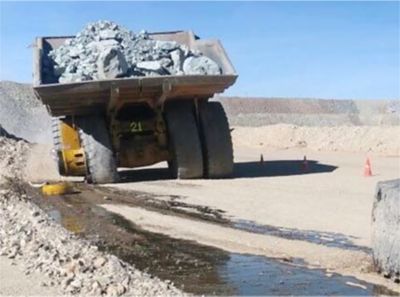 Mining truck with a wheel fallen off