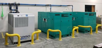 A nano brand of cycling dryer is installed as part of a complete compressed air system in a warehouse
