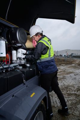 Technician with Next Generation of Genuine Filters