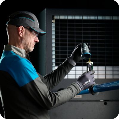 A profile shot of an Atlas Copco employee working