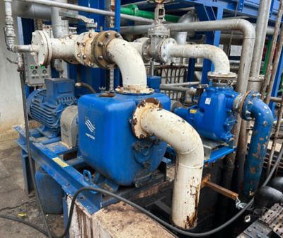 Self priming pumps for managing stormwater