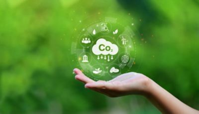 Reduce CO2 emission concept in the hand for environment