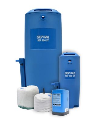 Three sizes of nano oil water separator tanks with their internal bags sitting among the group 
