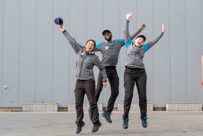 Group of 3 service technicians, male and female