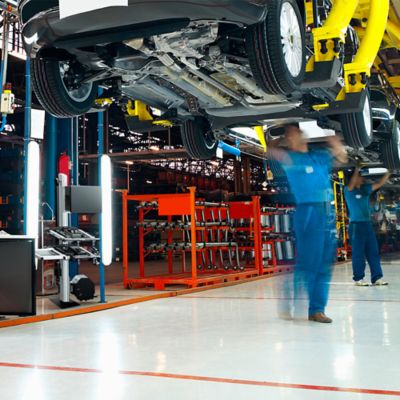 Stationary repair cart near assembly line