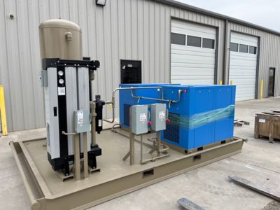 A nano modular desiccant dryer stands with a compressed air system as part of an installation for a Texas manufacturer