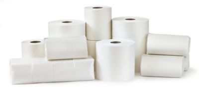 Rolls of toilet paper, paper towels and packs of napkins isolated on white background