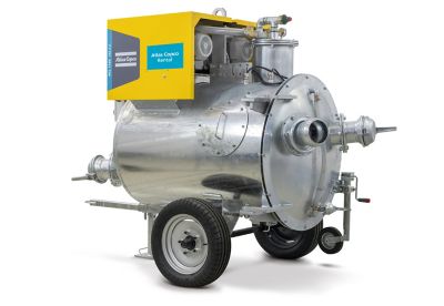 Stainless steel Atlas Copco WEL Tank pump on a trailer, for rent. Product photo of an industrial pump on a white background.