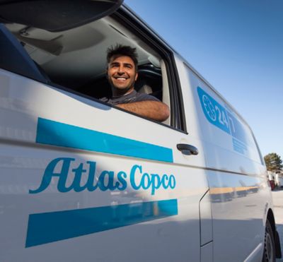 Photo session @ Atlas Copco Rental Europe; March 2013; people in action around different rental equipments: service; loading; connecting..