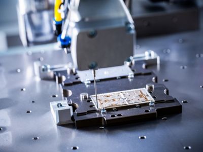 Close up of a sealing  application for power electronics electronics wiht dispensing technology from the Atlas Copco product line Scheugenpflug