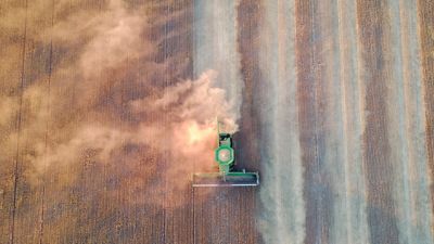 A drone shot of a combine harvesting in South Australia.