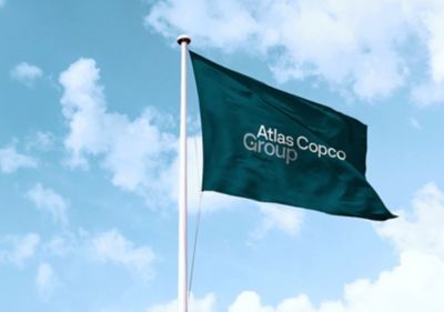 Flag post with Atlas Copco Group logo