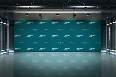 A large logo backdrop with Atlas Copco Group logotype printed in a regular pattern on teal