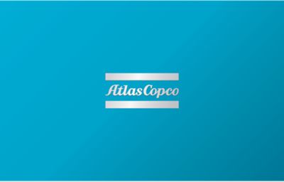 The back of a business card with a blue background and an Atlas Copco gradient logo