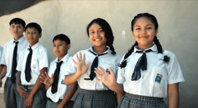Children in school uniforms in the district of Chulucanas in the northern part of Peru.