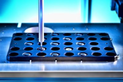 Close up dispensing material for battery cell components