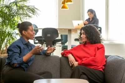 Two women talking in the office