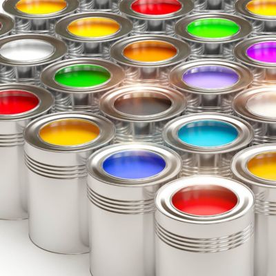 group of open paint cans in a variety of bright colors