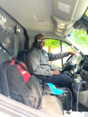 Cordell Wells in his service car.