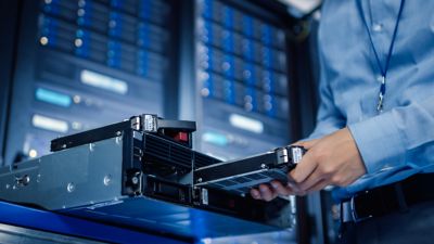 data center component being fixed by a human