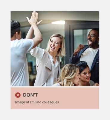 Colleagues giving hi-fives with caption: DON’T: Image of smiling colleagues