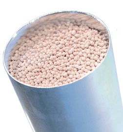 A barrel filled with desiccant material, which helps to keep compressed air dry