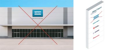 Facade signage incorrectly using “part of Atlas Copco Group” on the brand signage.